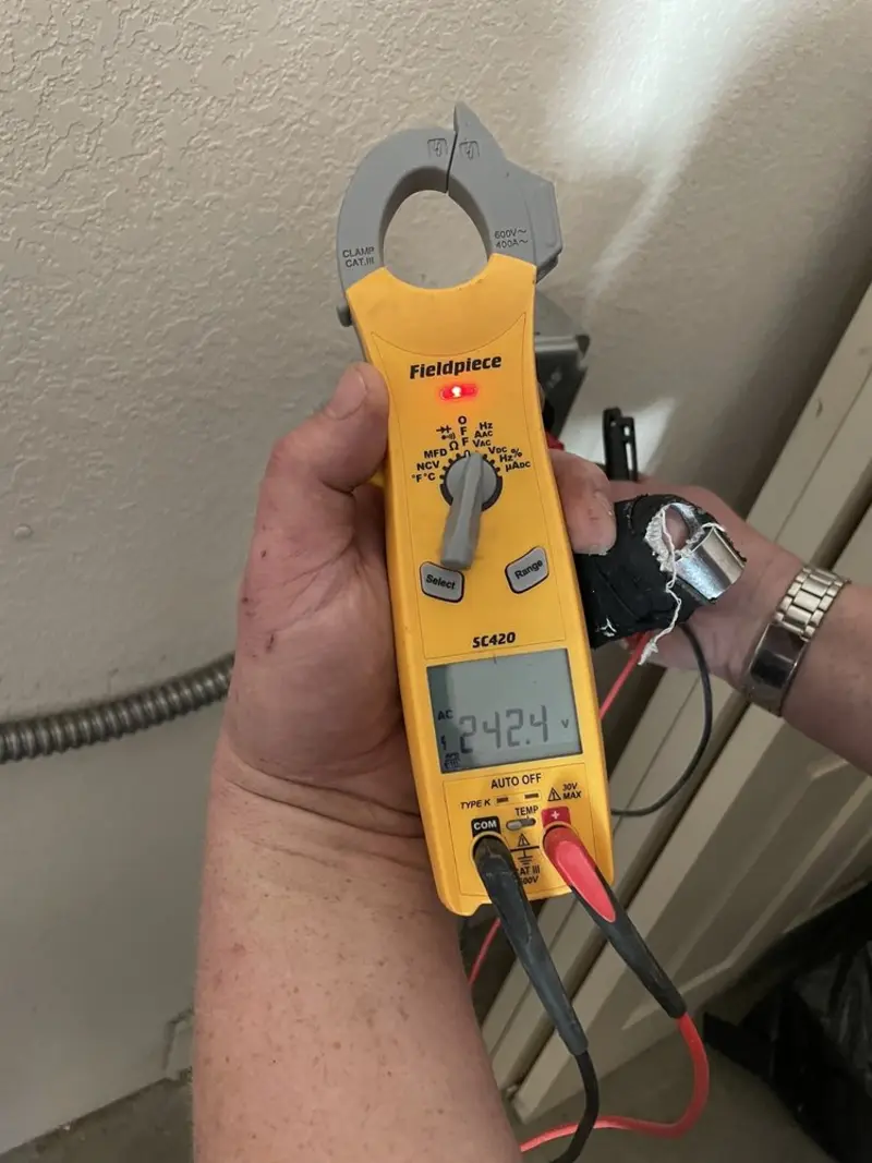 Voltage testing with clamp meter during Hot Tub / Pool Electrical Wiring in Seattle